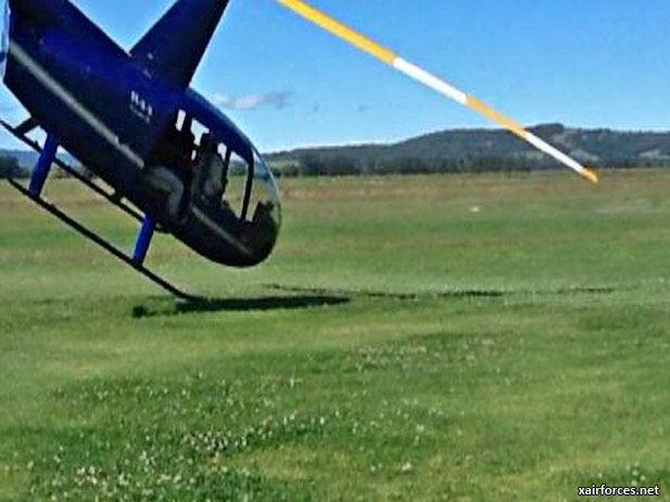 Attempt to close open door led to fatal R44 crash