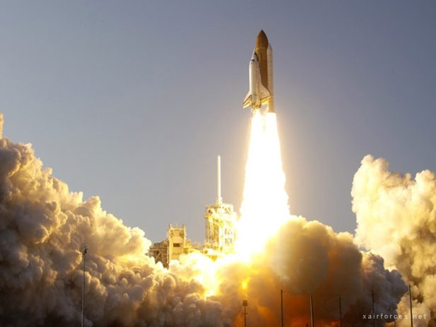 Space shuttle Discovery lifts off on final mission