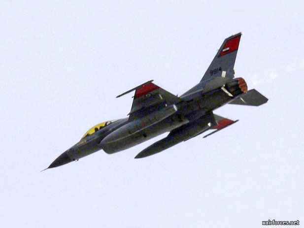 Egyptian F-16 fighter jets make low passes over the capital
