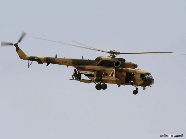 Kurdish troops fire on Iraqi army helicopter in dispute